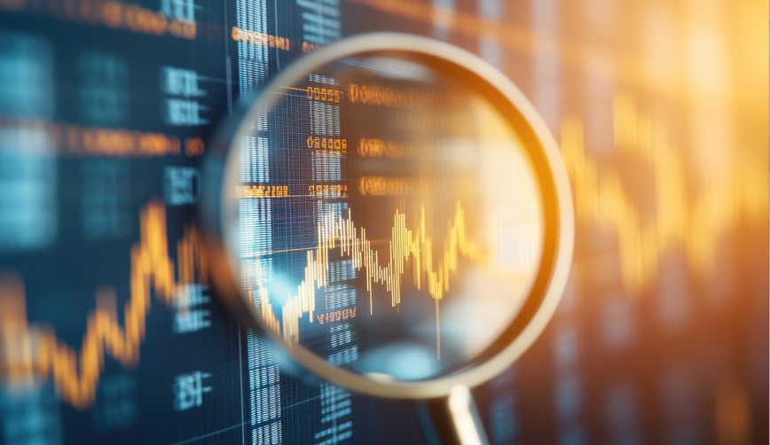 Man dressed in a blue suit, smiling